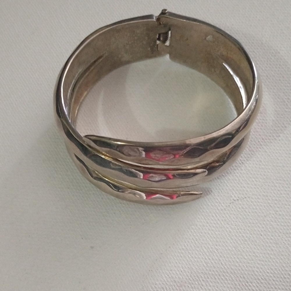 Brutalist Silver-Toned Metal Cuff Bracelet with Spring Closure